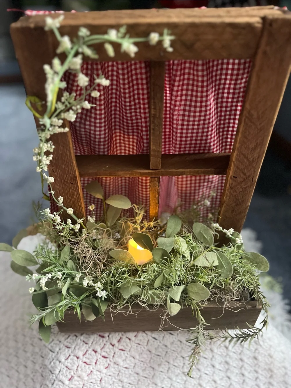 Rustic Windowbox Accent with Greenery and Soft Candle Light